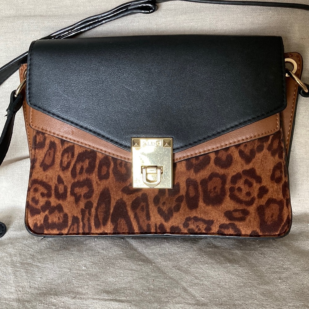 Chita print and black leather shouldercrossbody bag